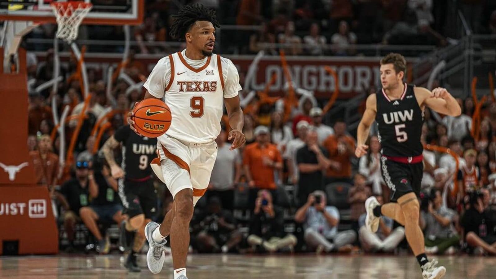 Hot-shooting No. 19 Texas eases to victory over Rice