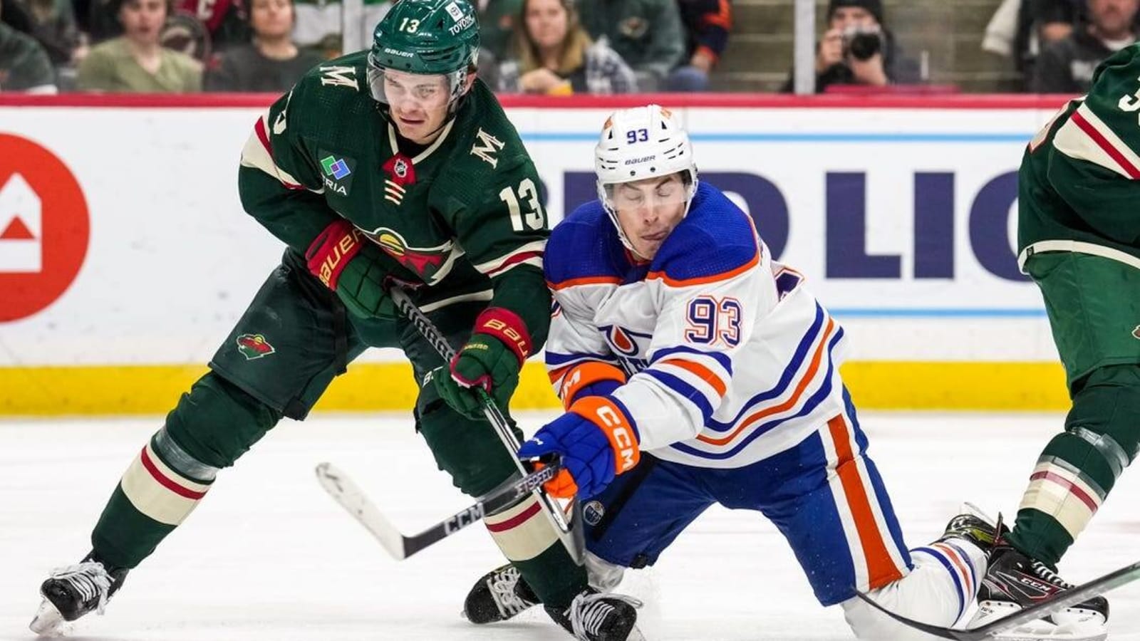 Wild rally late to cool off red-hot Oilers