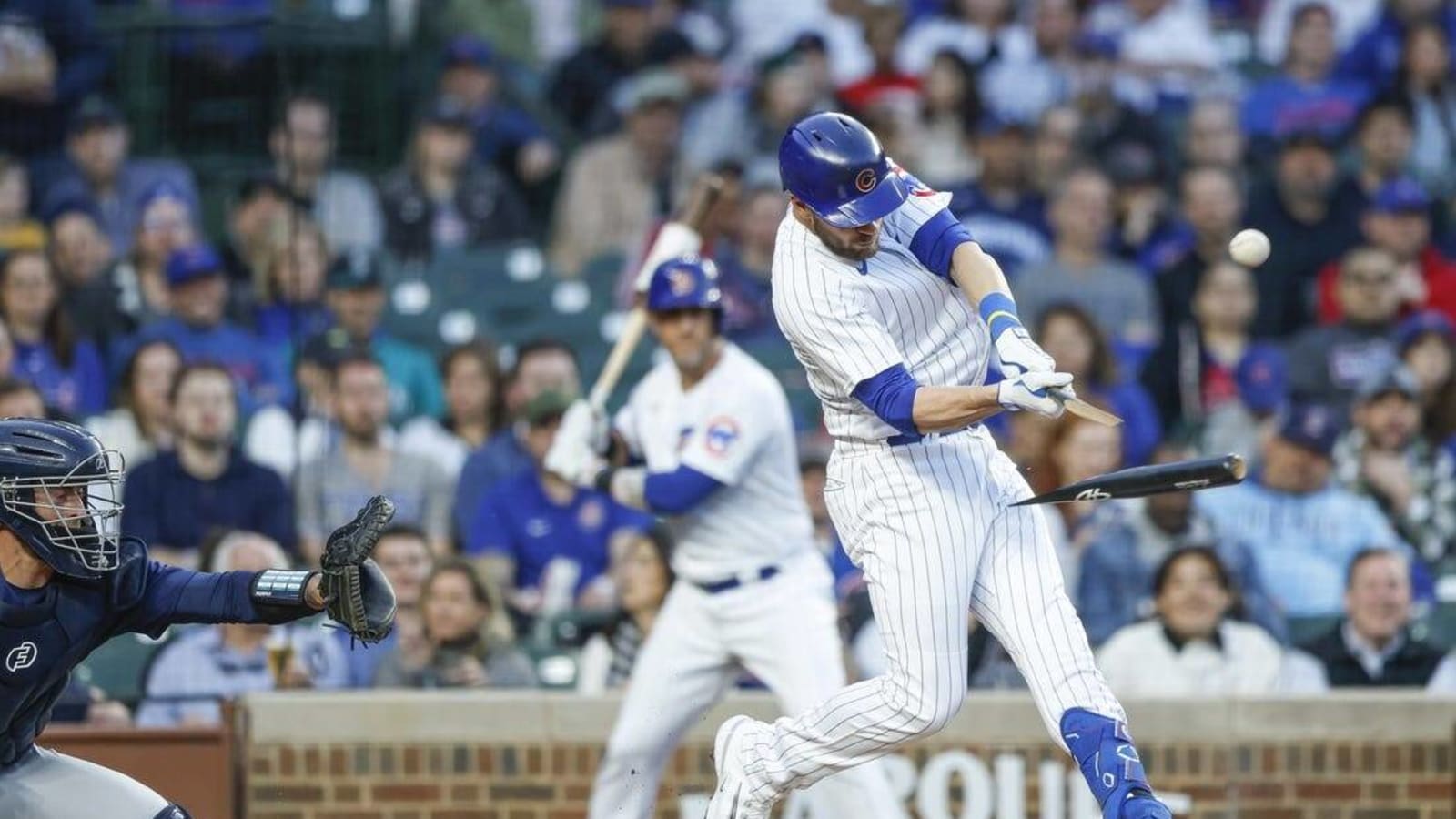 Cubs hold off Mariners&#39; threat, win in 10th inning