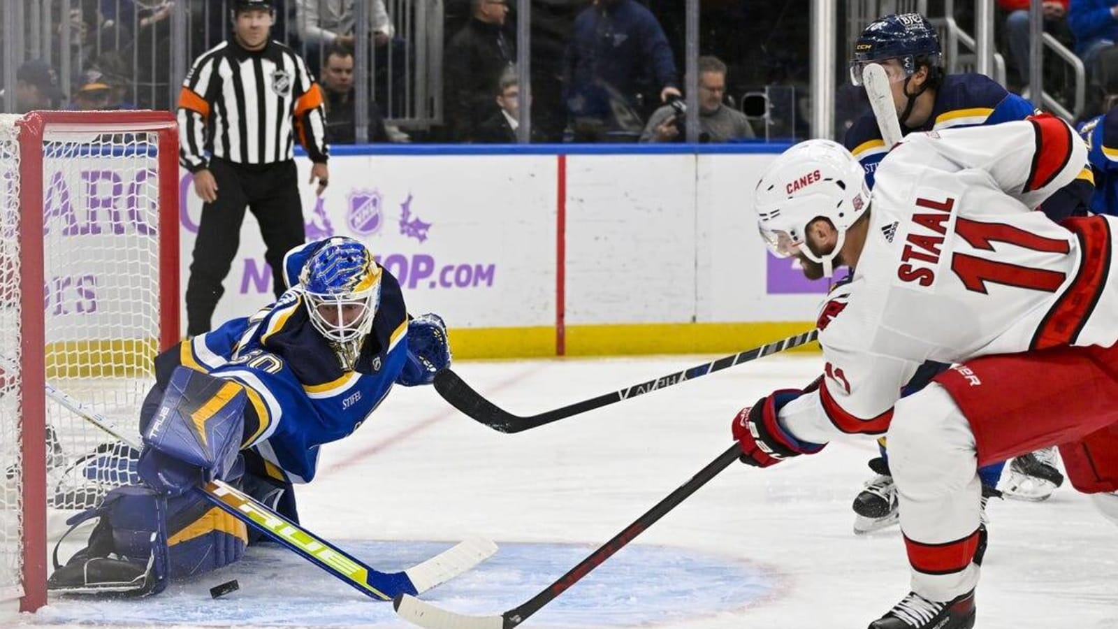 Jordan Martinook&#39;s hat trick propels Blues past Hurricanes