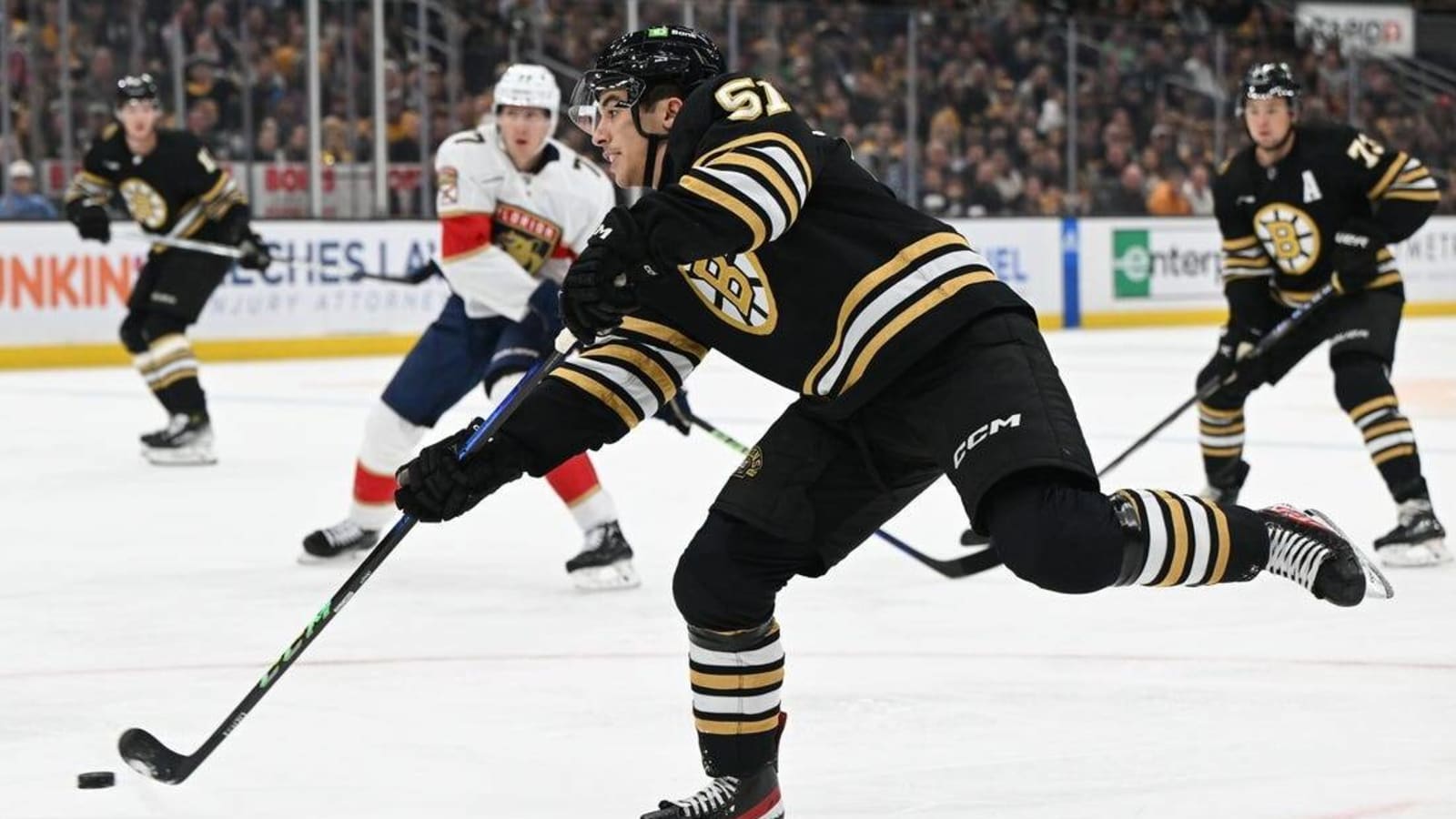Down two defensemen, first-place Bruins face Leafs