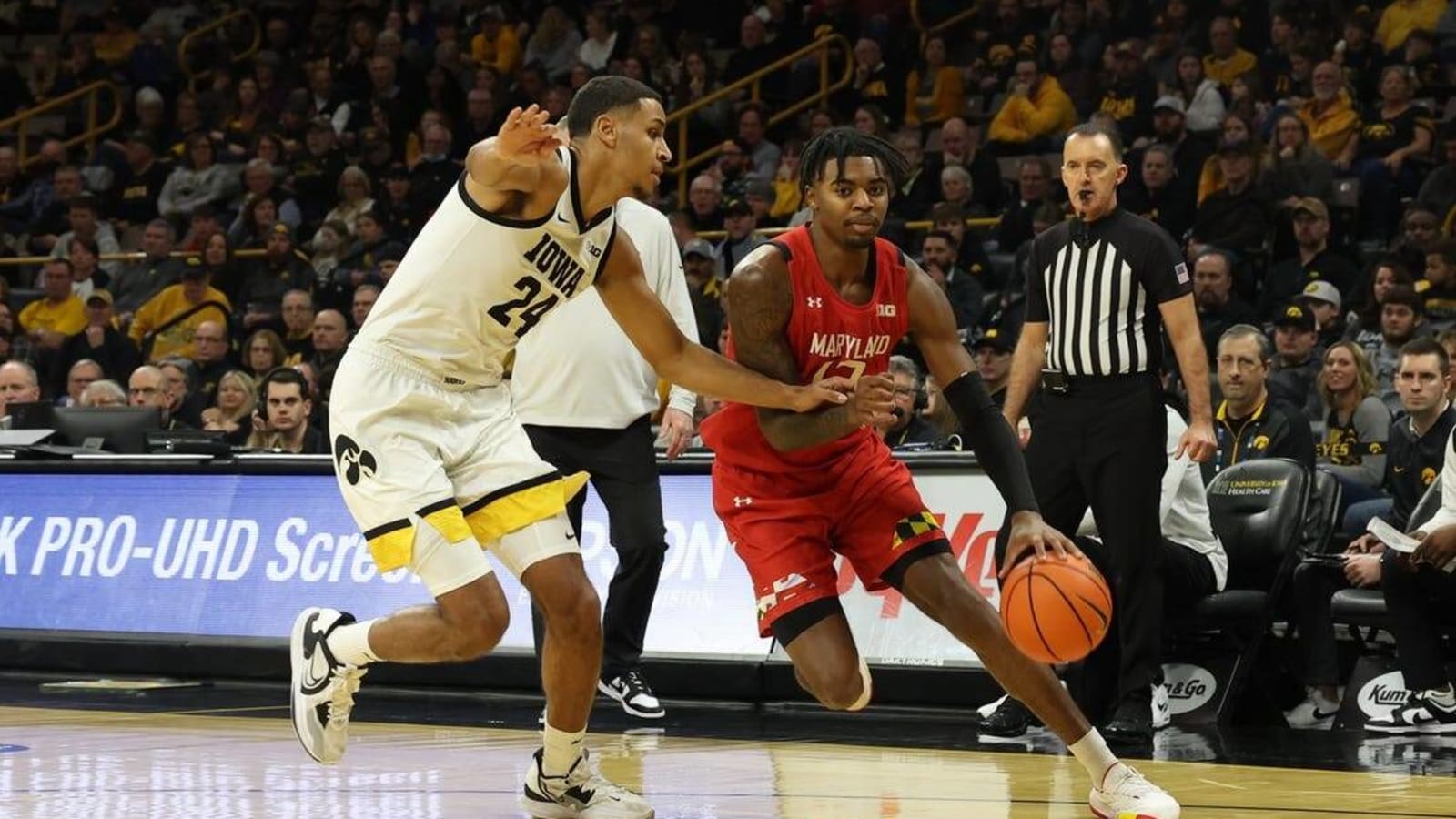 Up-tempo Iowa races past Maryland