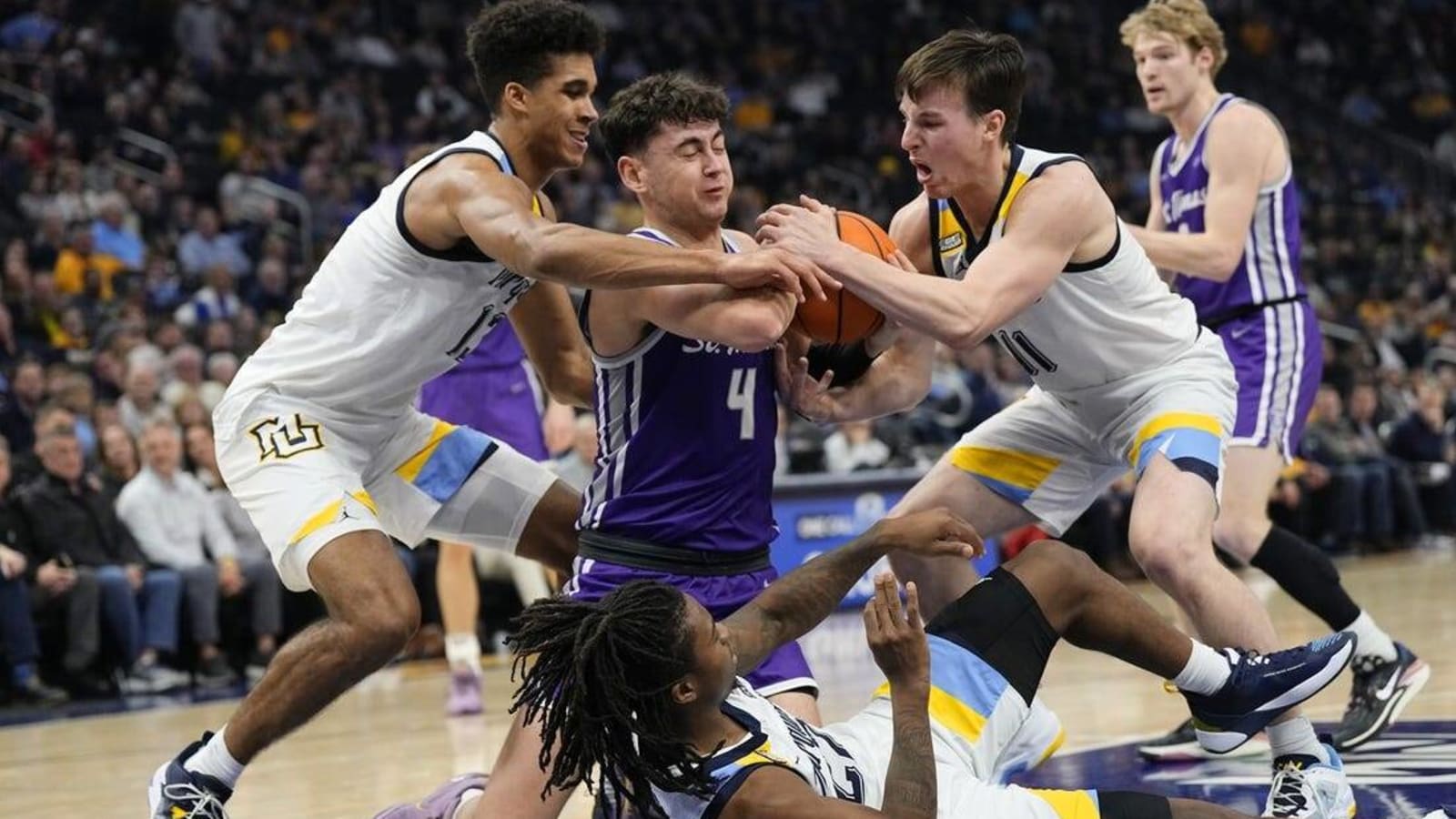 No. 7 Marquette holds off upset-minded St. Thomas