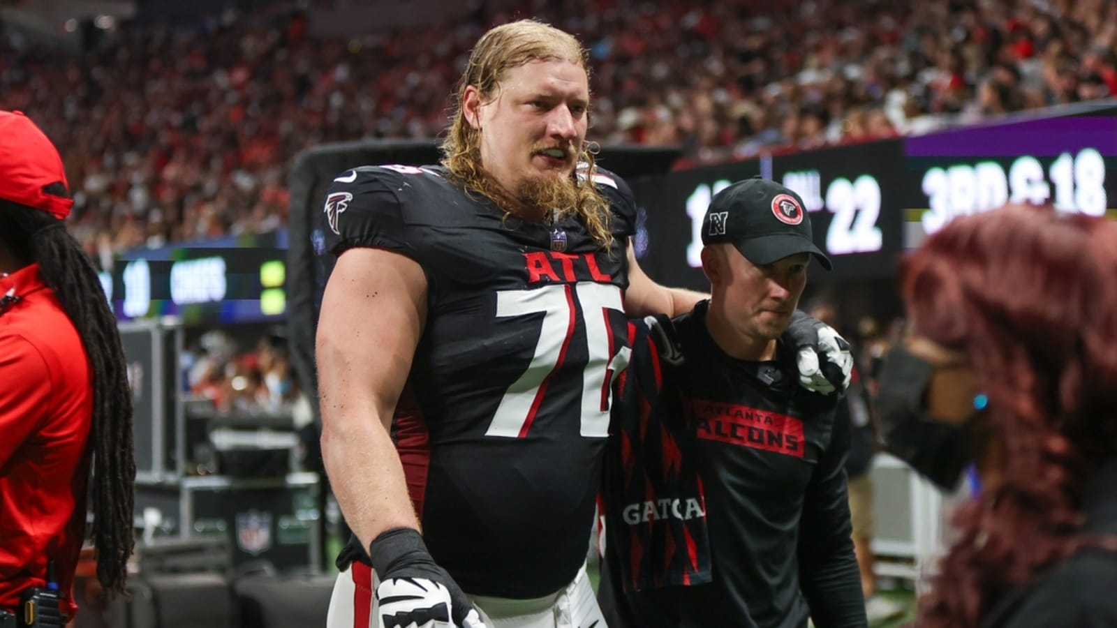 Falcons starting RT Kaleb McGary carted off practice field