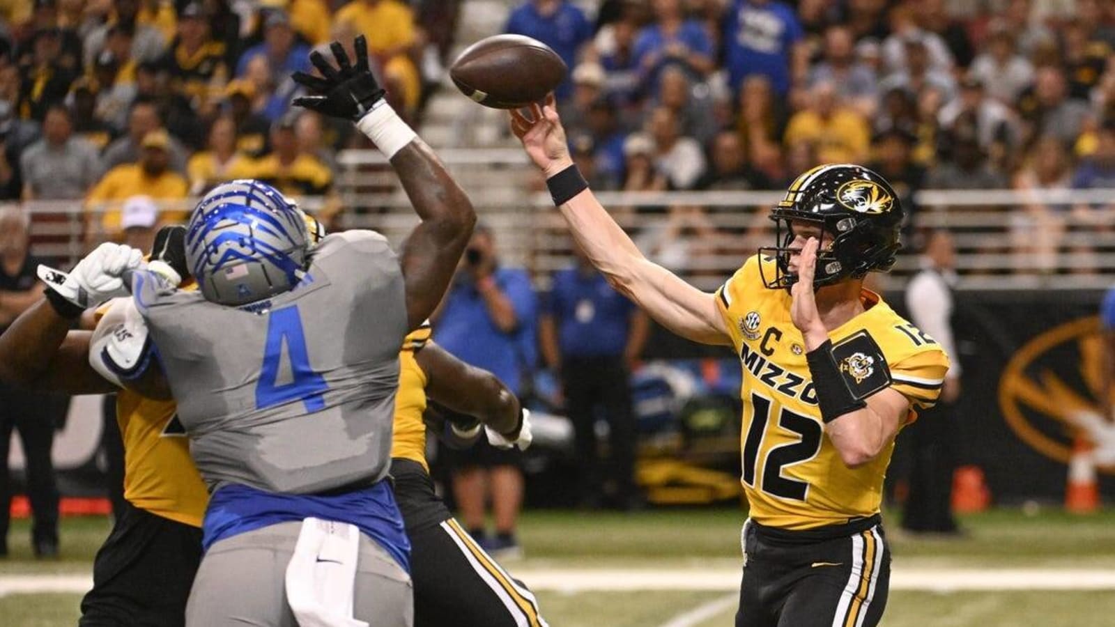 Brady Cook&#39;s big night helps Missouri hold off Memphis