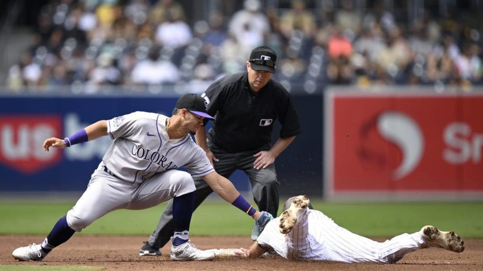 Padres rally to claim seventh straight win, 3-2 over Rockies