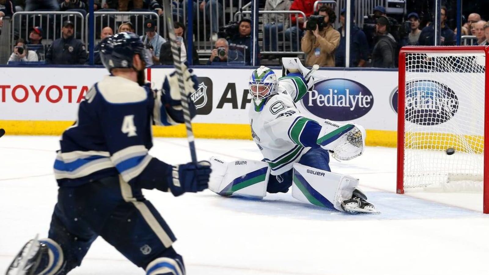 NHL roundup: Jackets rally in OT as Canucks collapse again