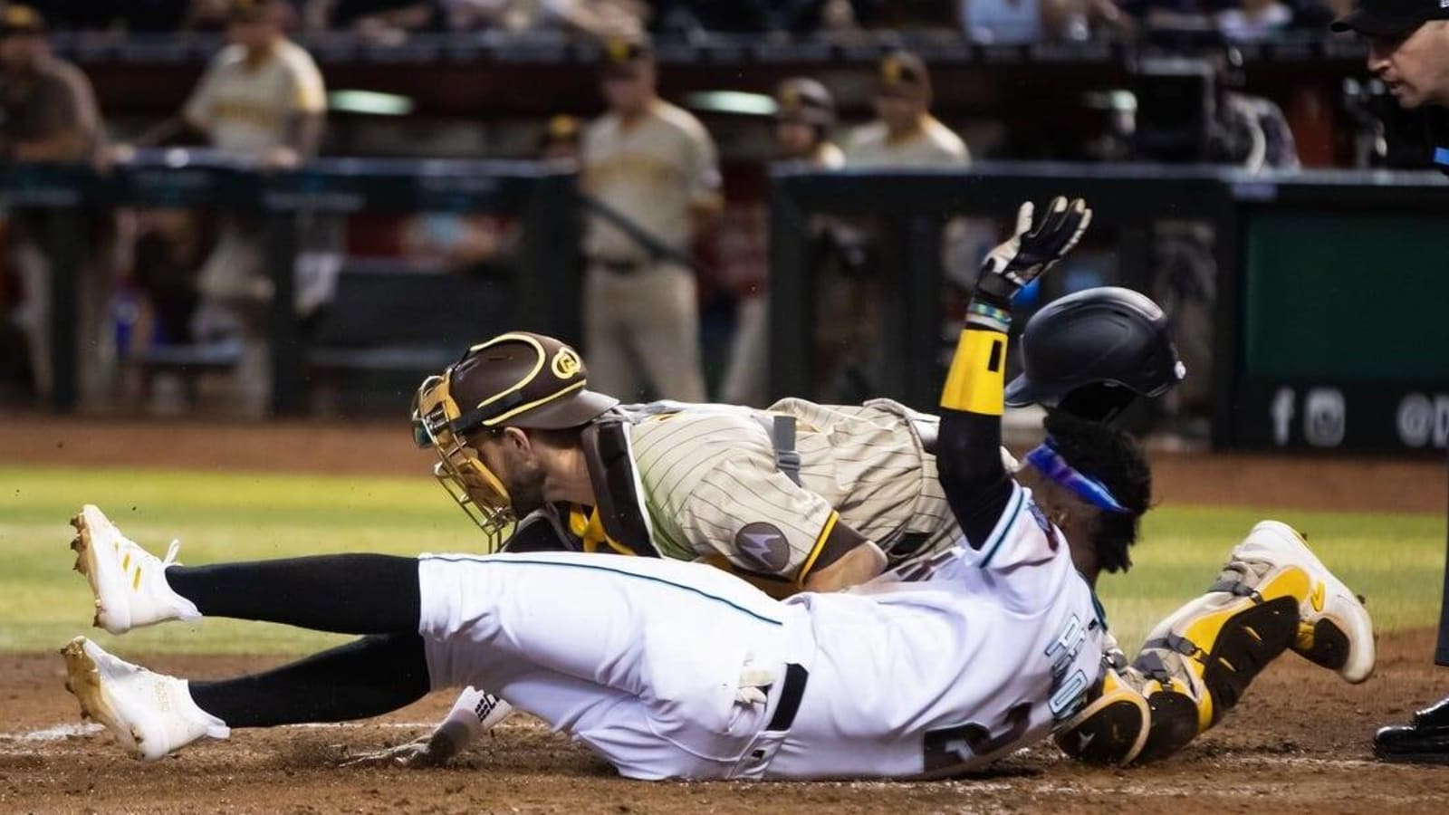 Trent Grisham drives in four as Padres hold off D-backs