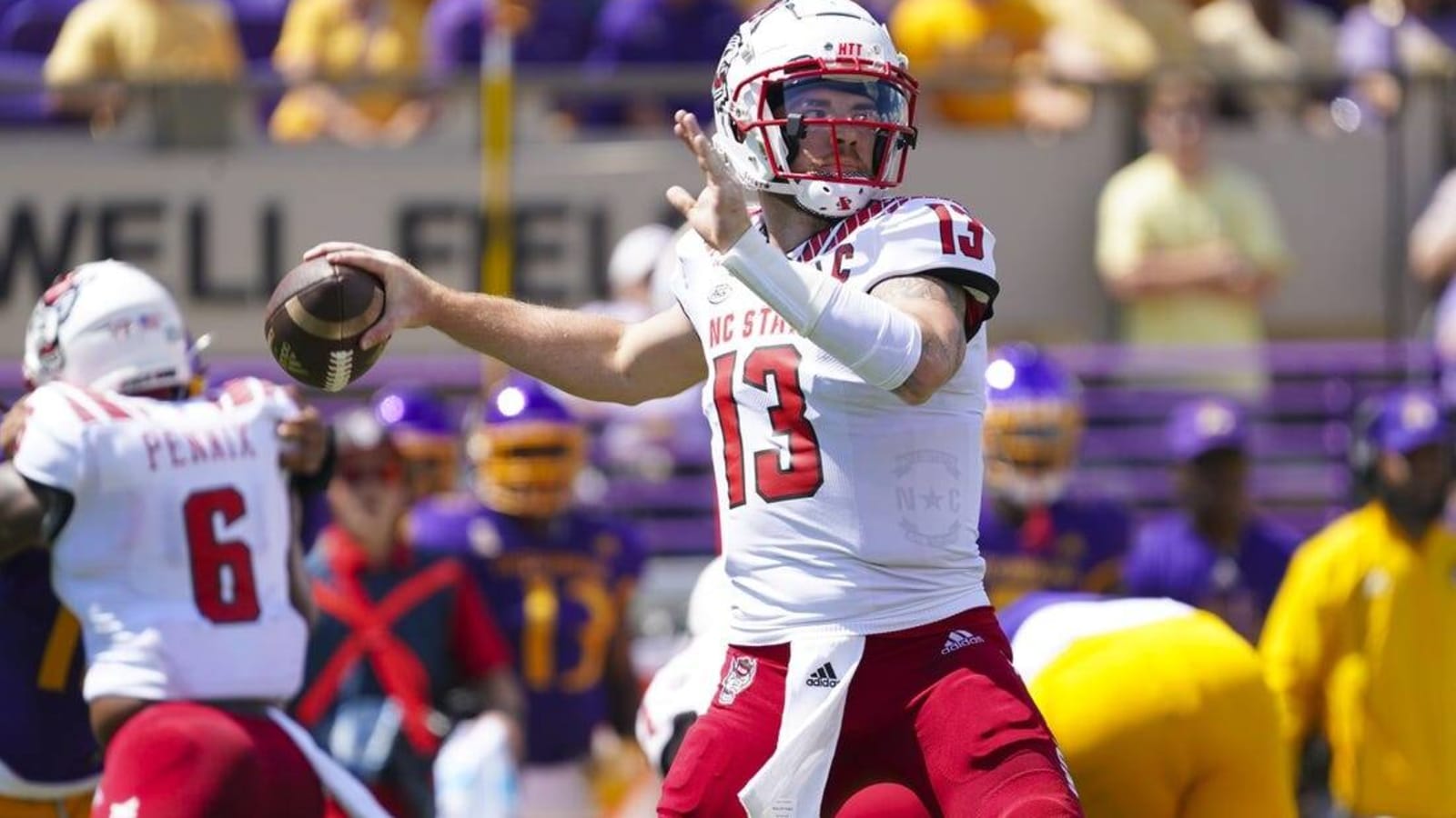 No. 13 NC State escapes East Carolina 21-20 on late missed kicks