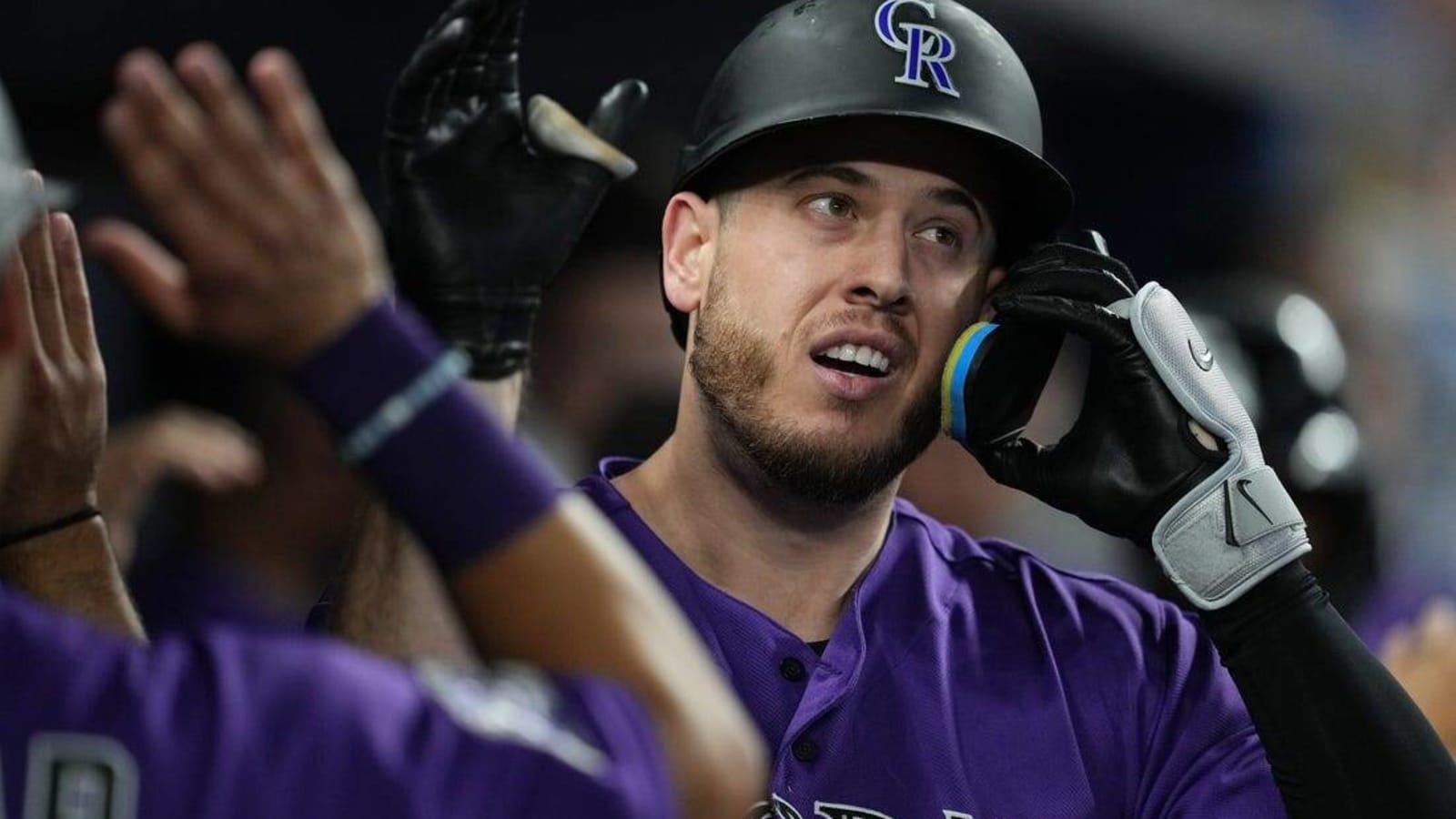 Rockies bash three homers, cruise past Marlins