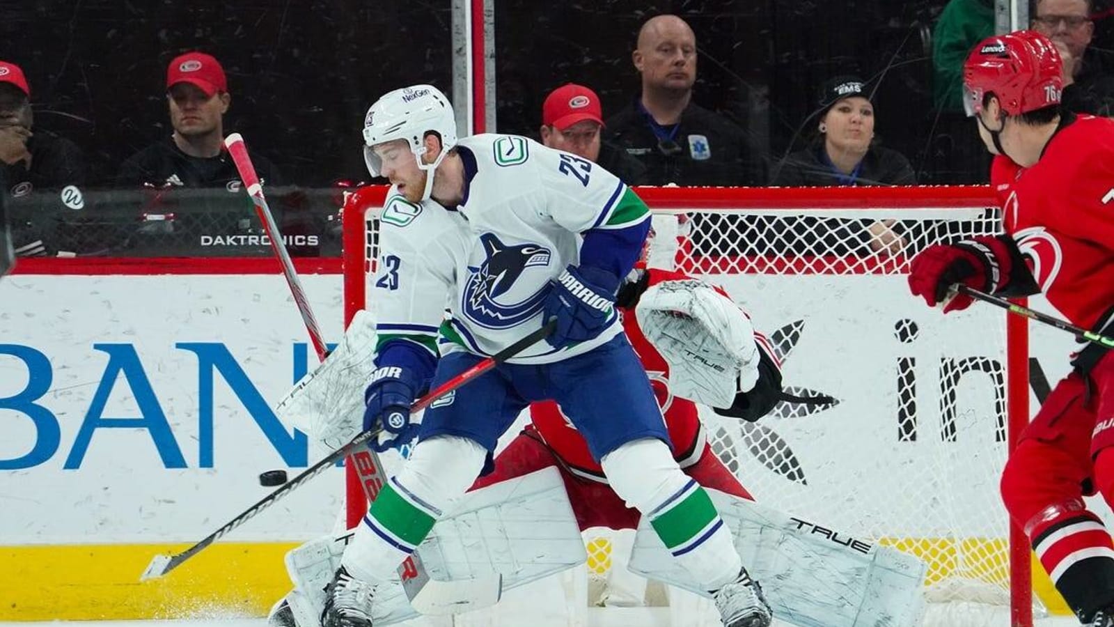 Elias Lindholm helps Canucks down Hurricanes in team debut