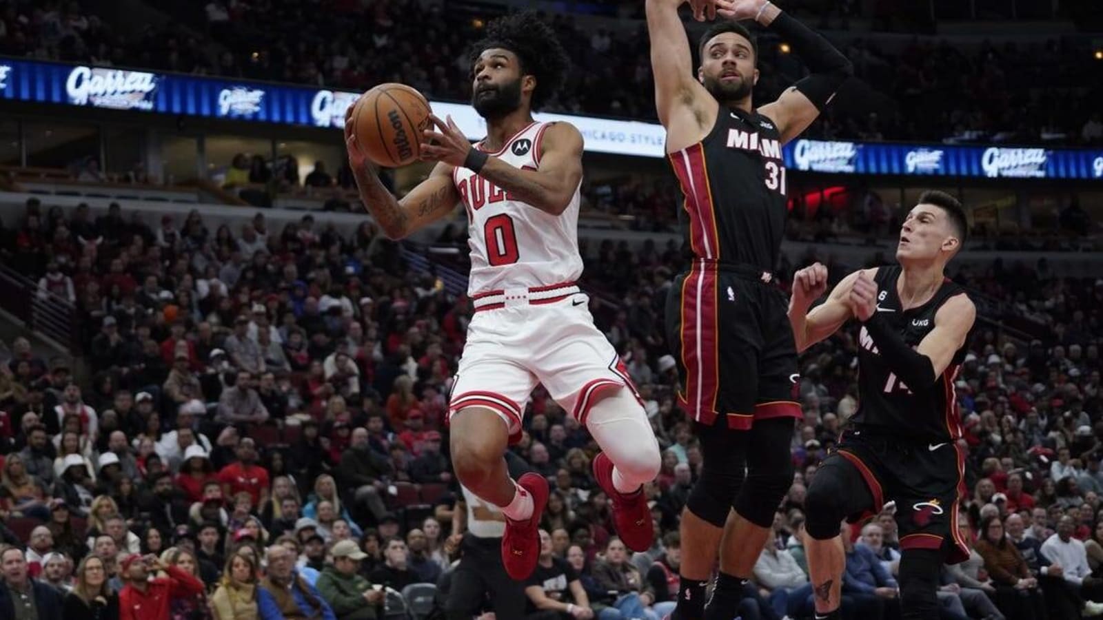 Bulls hold Heat at bay, earn 4th win in 5 games