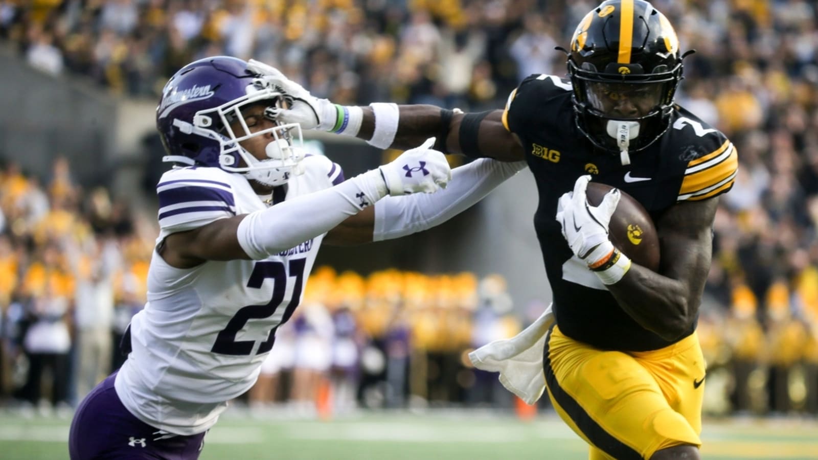 After 2nd-quarter QB change, Iowa reels off 35 unanswered to rout Northwestern