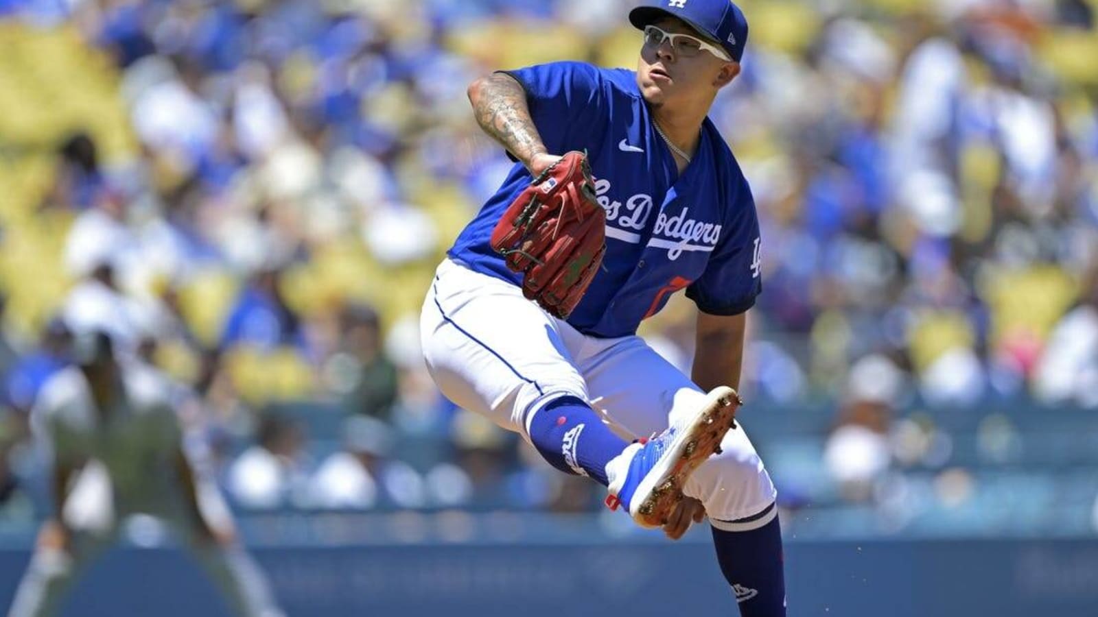 Miguel Rojas, Julio Urias help Dodgers finish 4-game sweep of Rockies