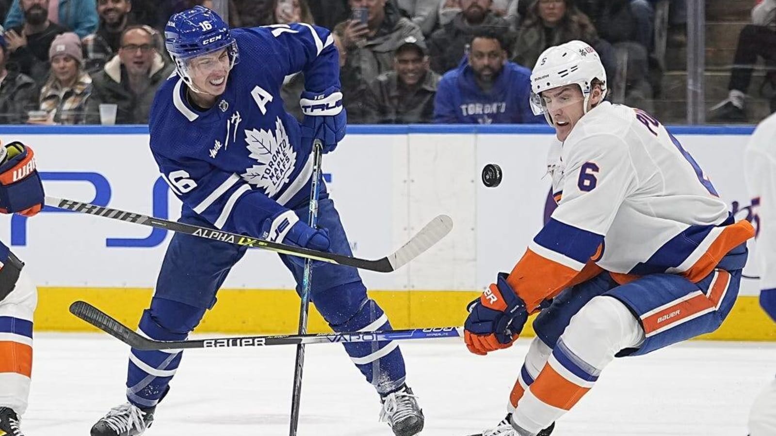 Islanders tie game late, beat Leafs in OT