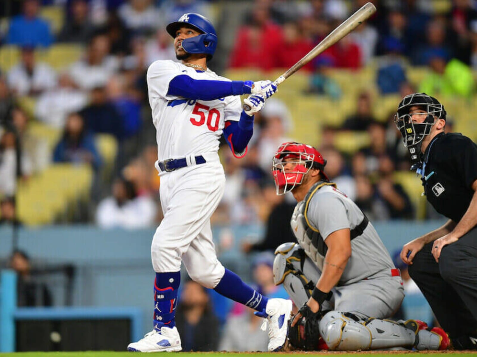 Rollins breaks the tie with a three-run homer 