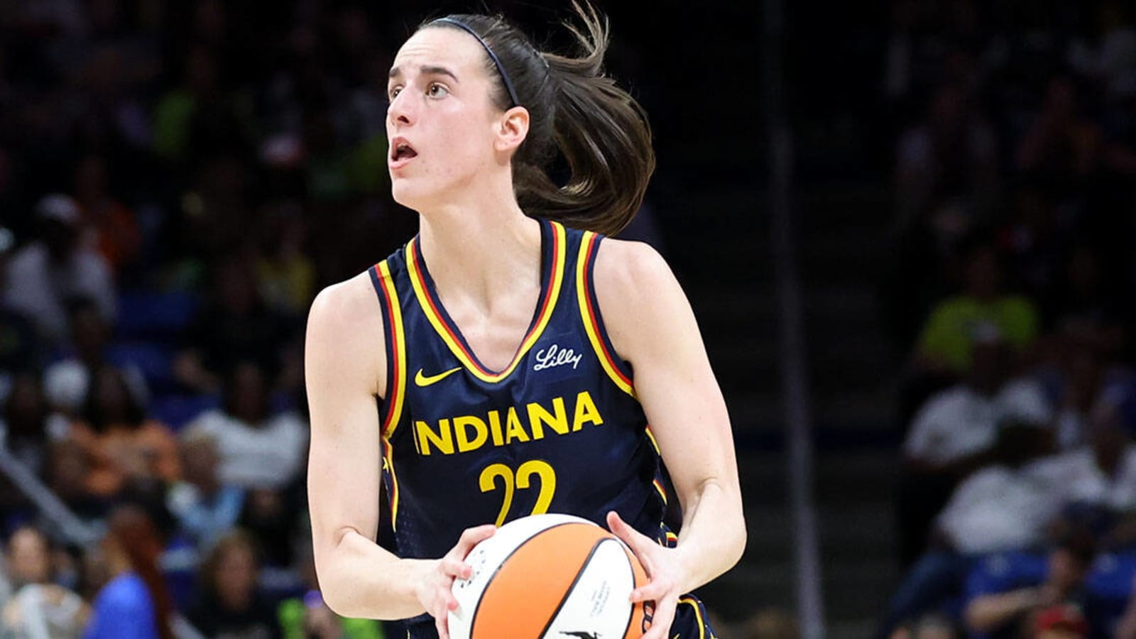 Caitlin Clark makes three point shot from logo during Fever vs Sun