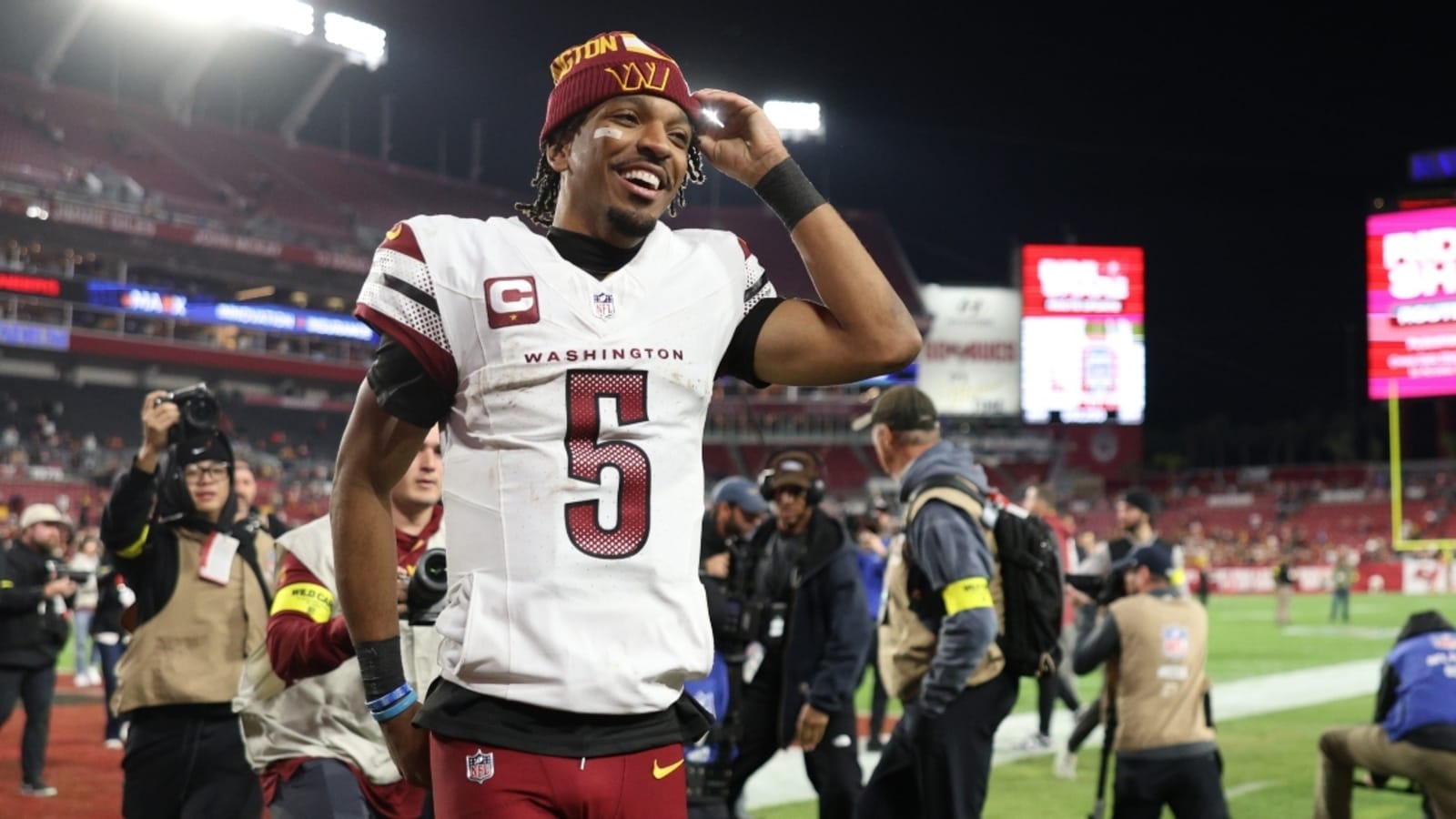 Jayden Daniels’ mom rocks custom jacket covered in pictures of Commanders QB