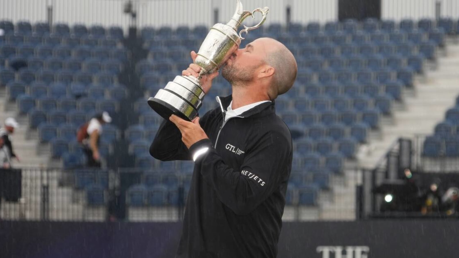 Brian Harman chugs beer out of Claret Jug after The Open win