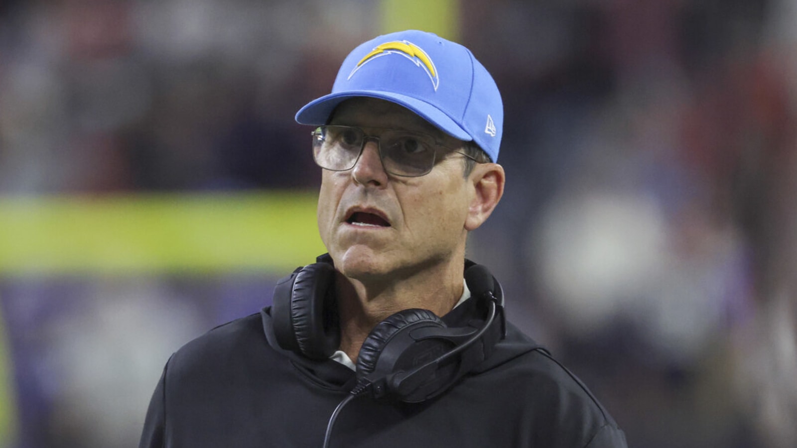 Jim Harbaugh evaluates Justin Herbert's performance in playoff loss