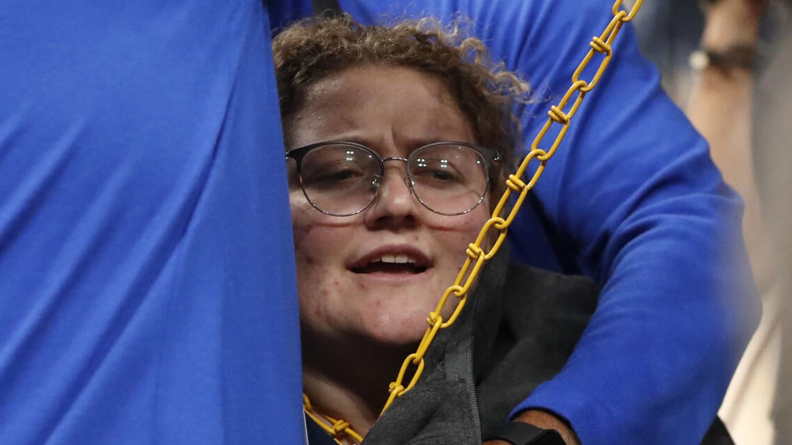 Woman chains herself to basket at T-Wolves-Grizzlies game