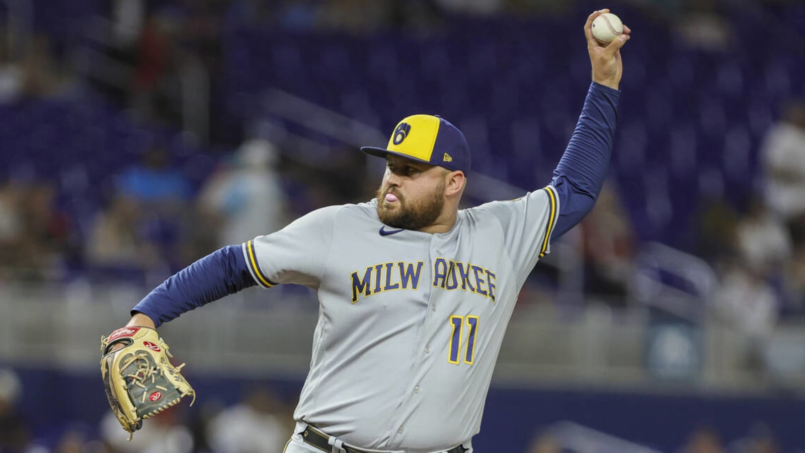 Brewers clinch playoff spot with 1B on the mound