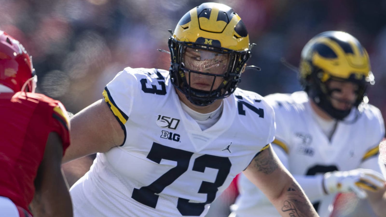 Michigan OL Jalen Mayfield opts back in to season