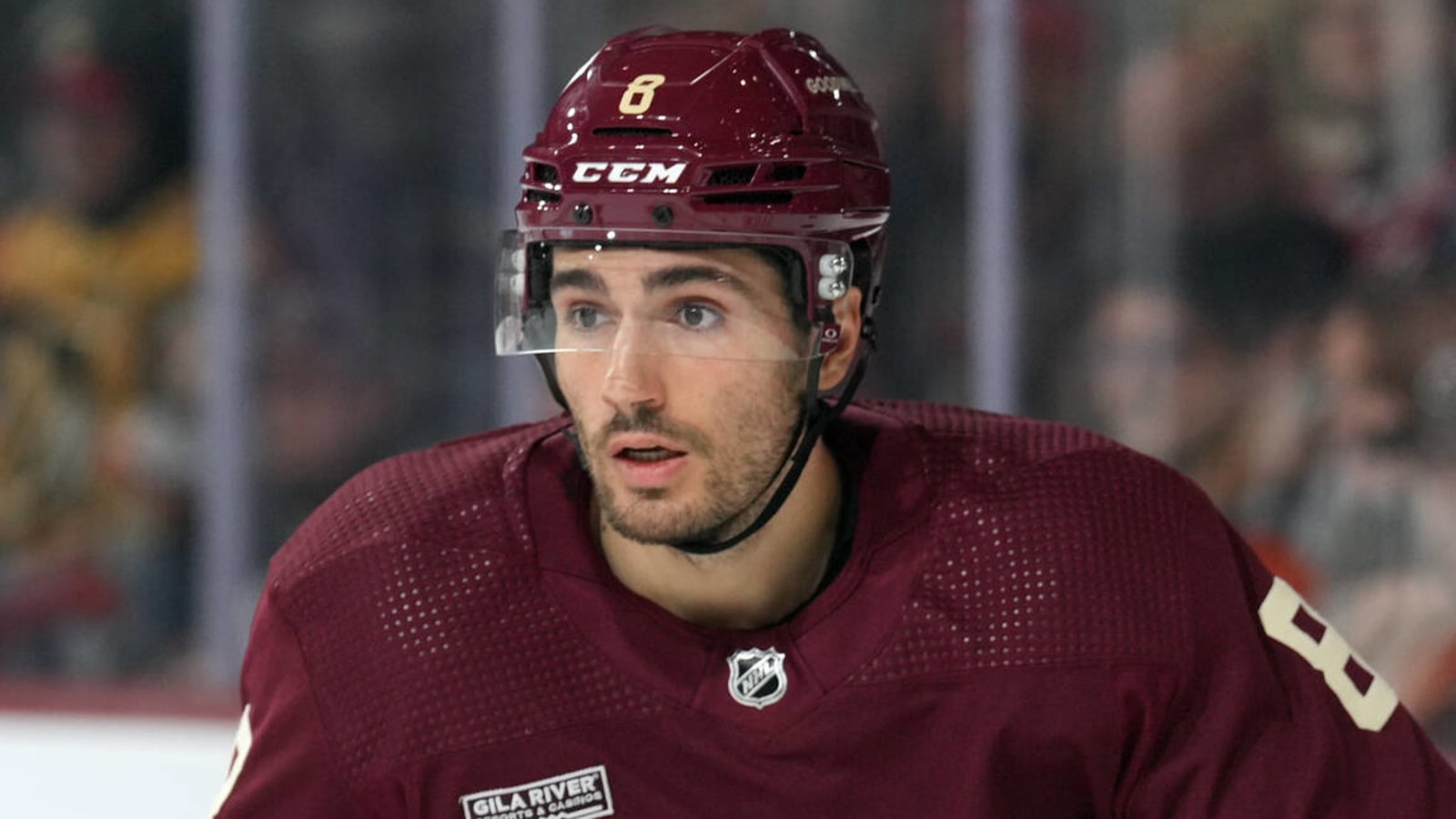 Coyotes' Nick Schmaltz leaves game after taking puck to face