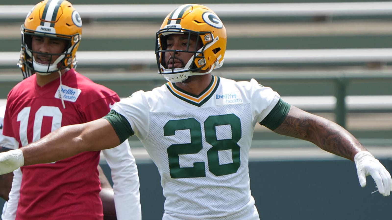 Packers RB AJ Dillon runs over minor league mascot