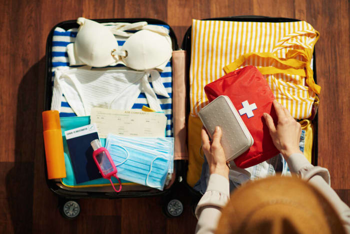 Pack a first-aid kit in your carry-on