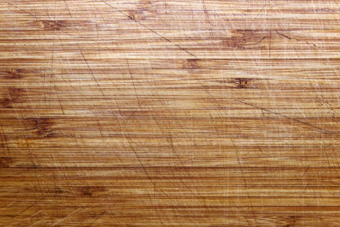 Use a walnut to repair hardwood floor scratches