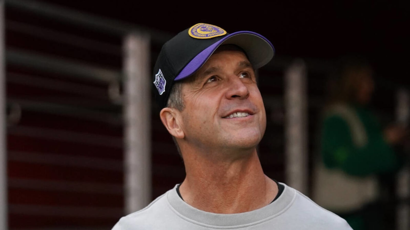 Watch: John Harbaugh surprises brother, Jim, at CFP title game