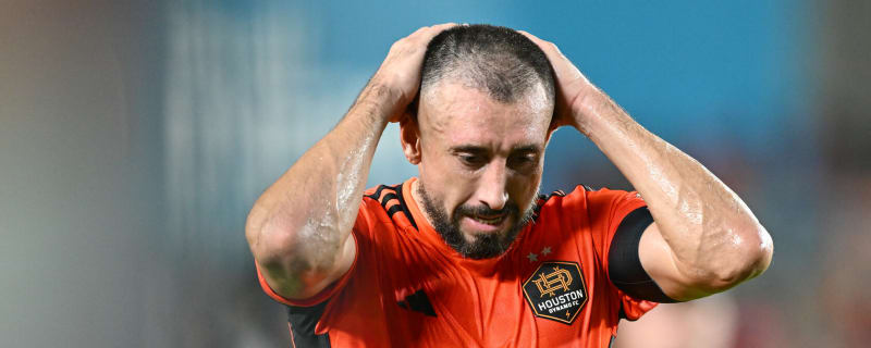 Dynamo captain sent off from playoff game for spitting at referee