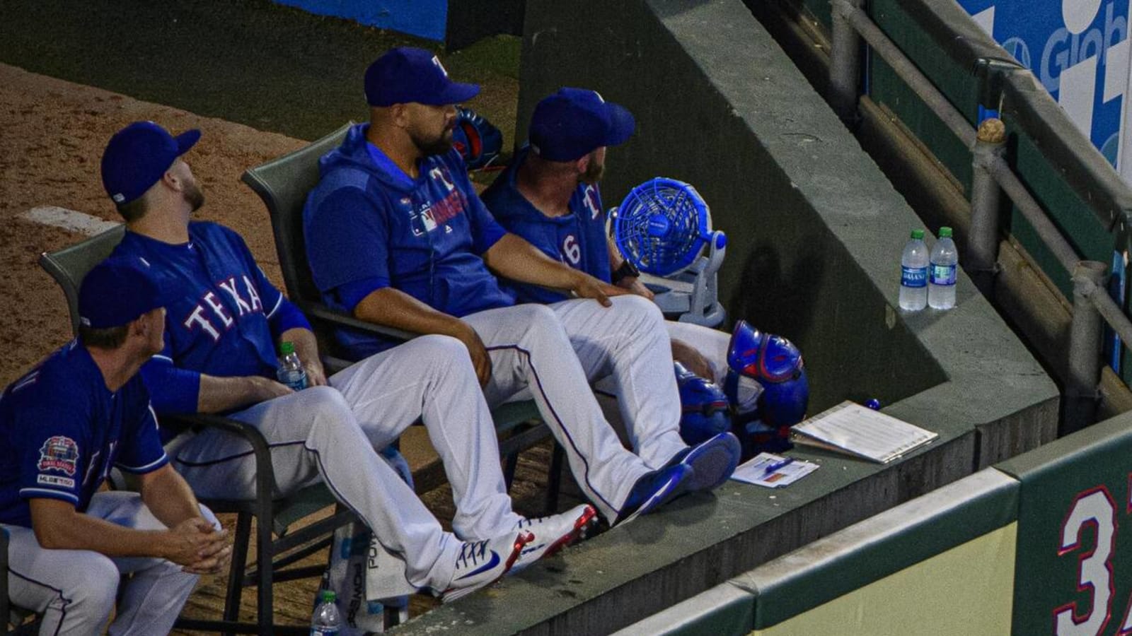 Rangers relievers caught trying to watch game from Coors Field trees