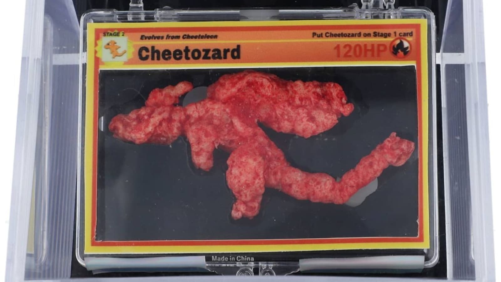 A POKÉMON Shaped Cheeto, the Cheetozard, Is Up for Auction and It Is Pricey