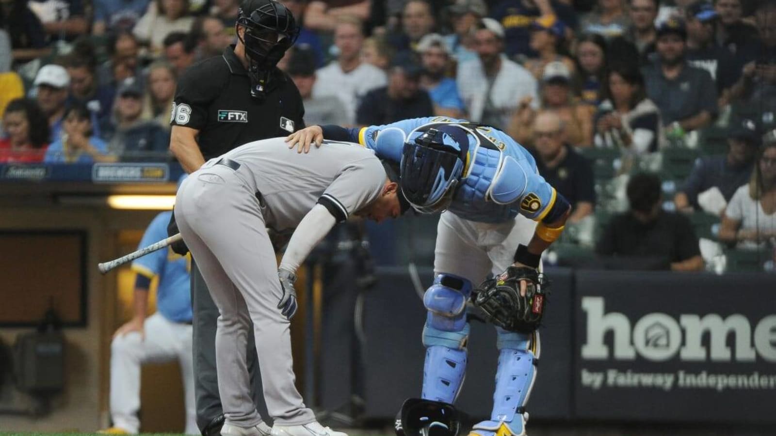 Watch: Yankees Marwin Gonzalez Gets Hit in Head by Catcher&#39;s Throw