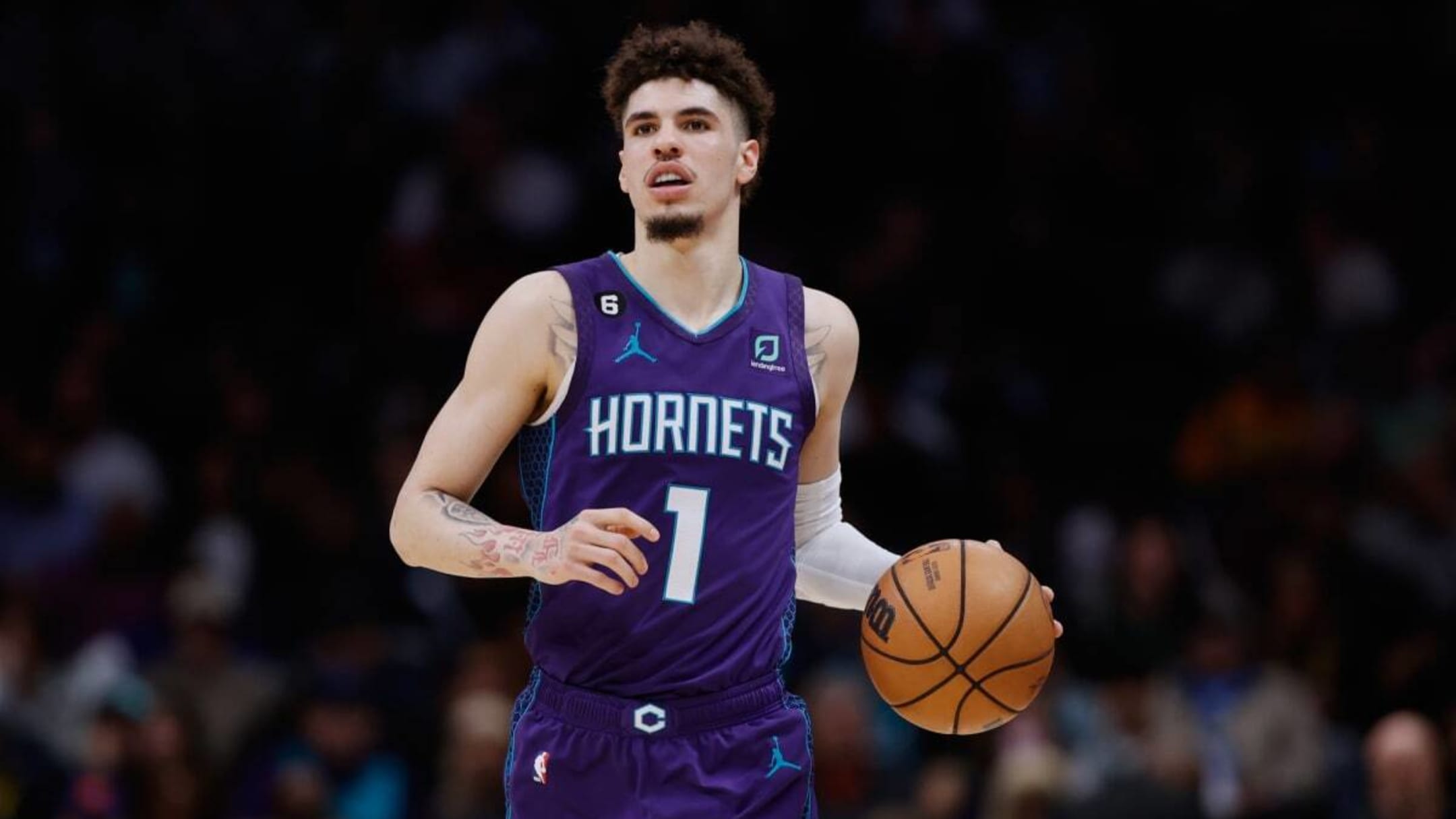 Charlotte Hornets guard LaMelo Ball (1) brings the ball up court