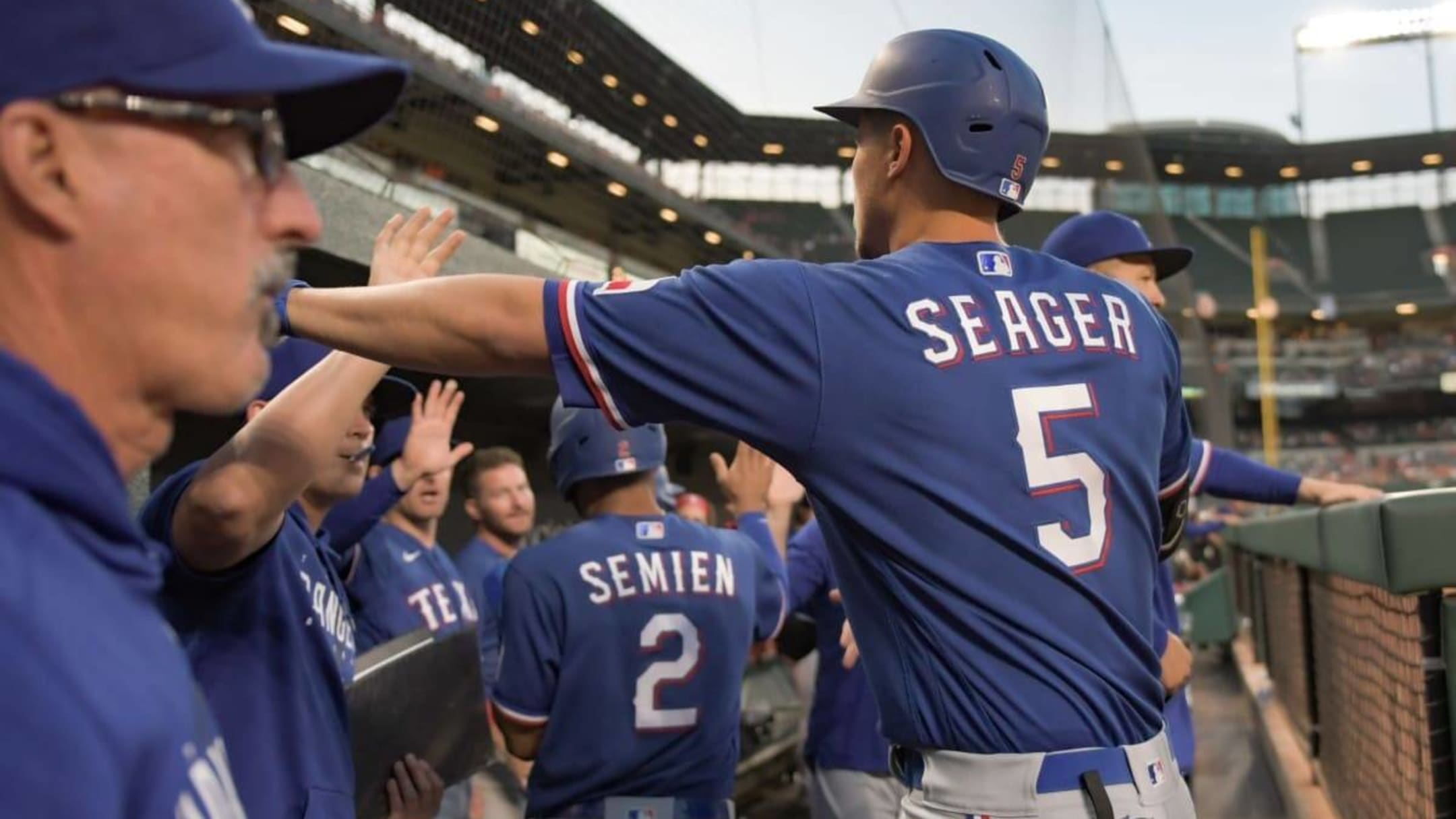 Rangers beat Orioles 12-2