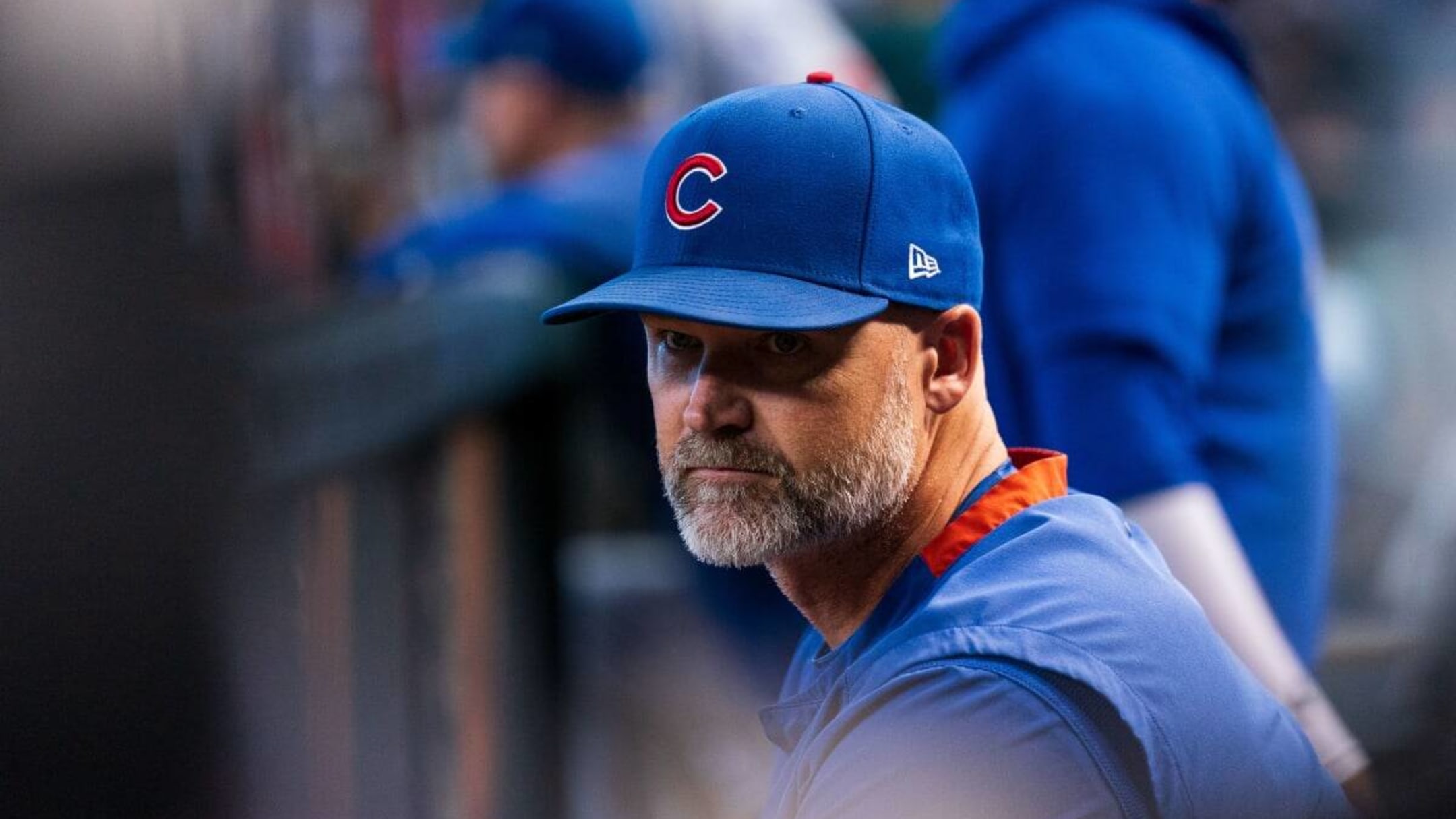 Chicago Cubs manager David Ross, second from left, talks to