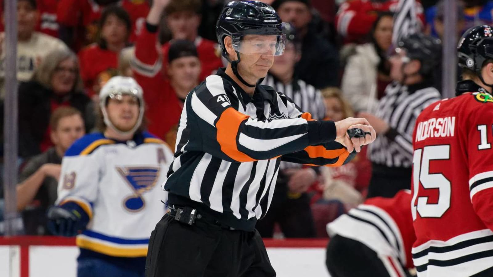 Referee Steve Kozari stretchered off the ice after collision with Lightning’s Haydn Fleury