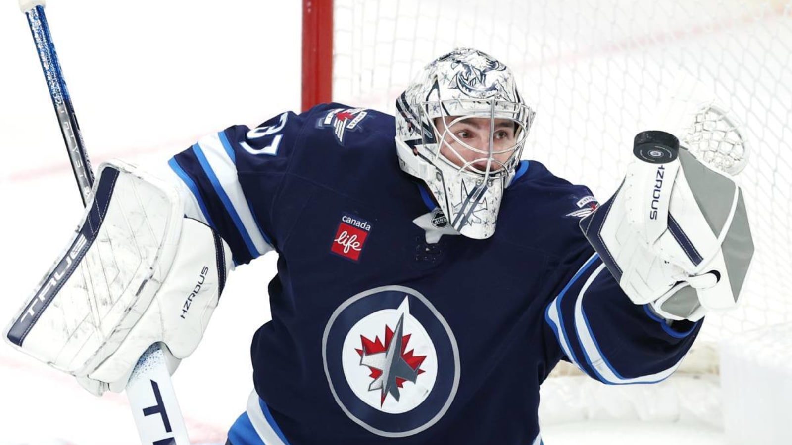 Jets’ Connor Hellebuyck becomes third-fastest goalie in NHL history to reach 300 wins