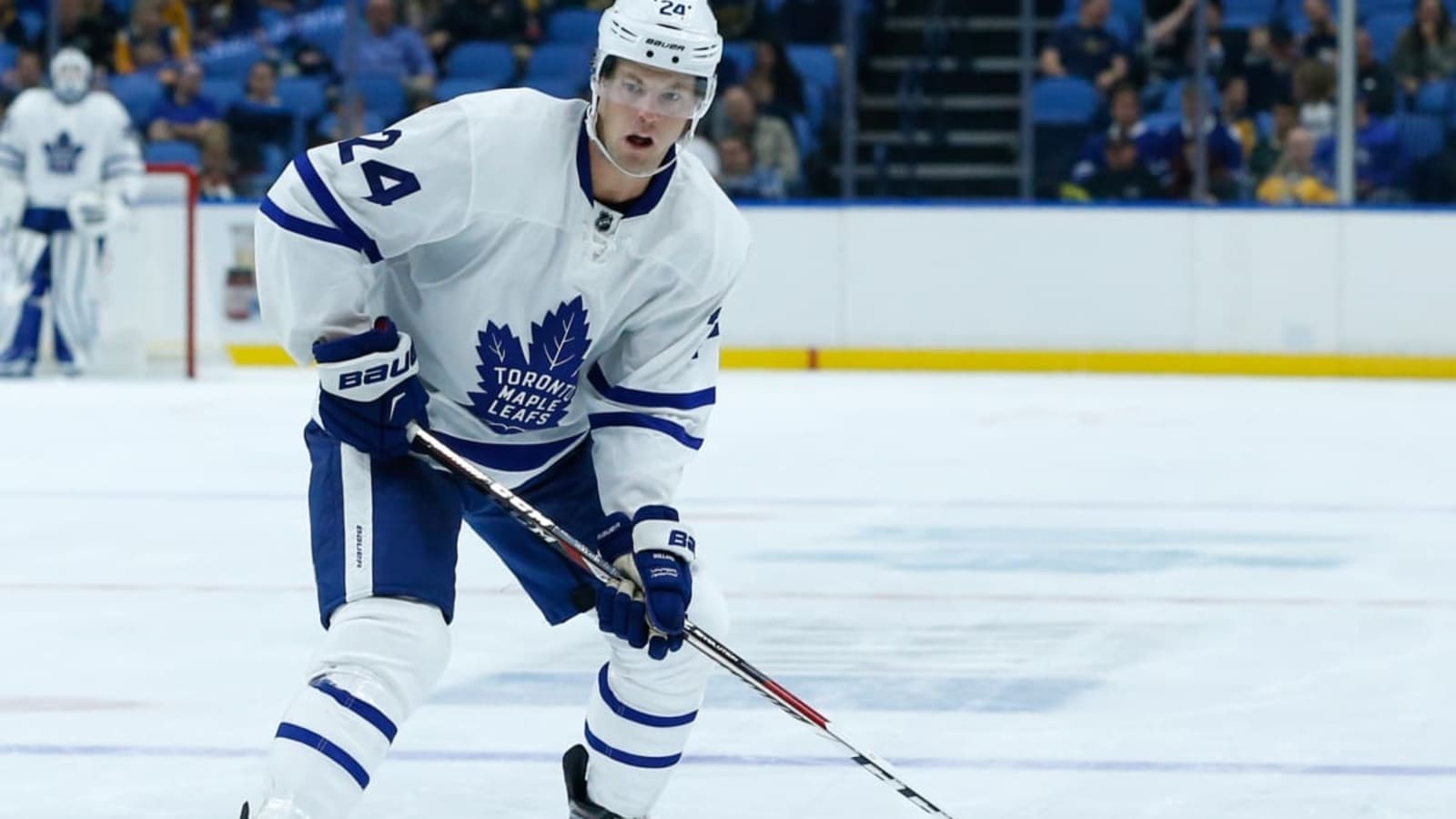 Former Leafs forward Peter Holland sticks up for Cedric Pare following collision with Patrik Laine
