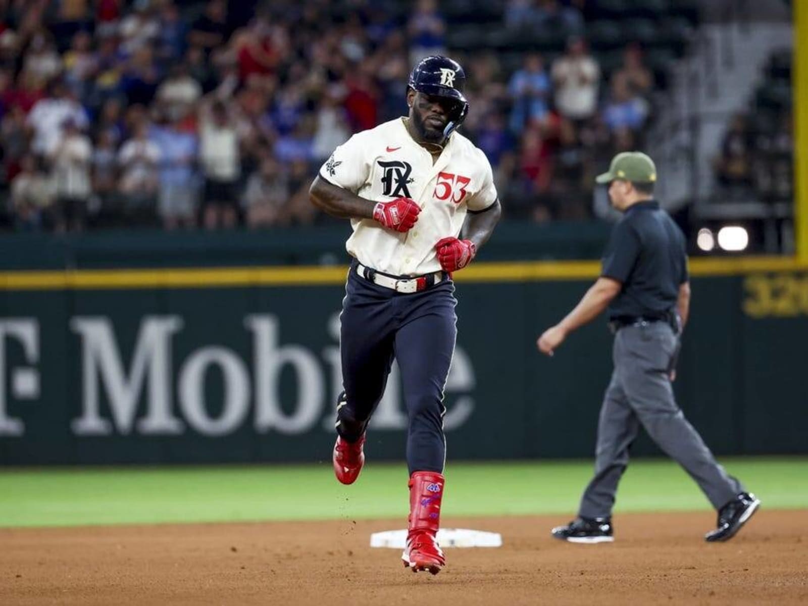 Martin Perez, Adolis Garcia lead Rangers past Rockies