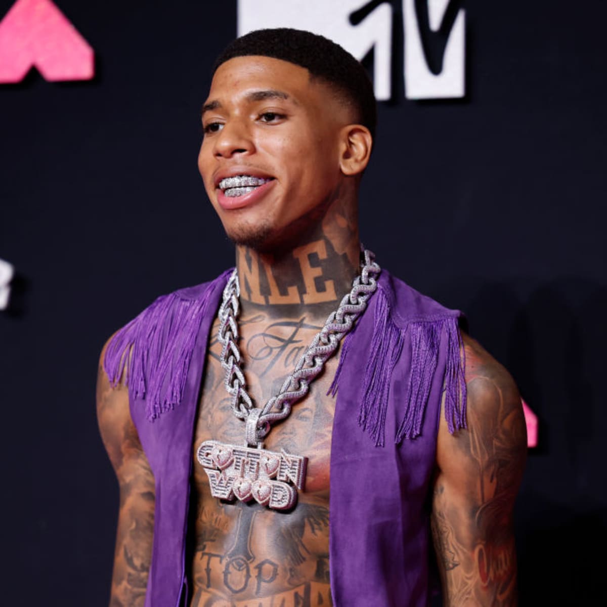 NLE Choppa Reveals a One-Night Stand Once Broke Into His House to Lay in  His Bed | Yardbarker, image size:1200x1200