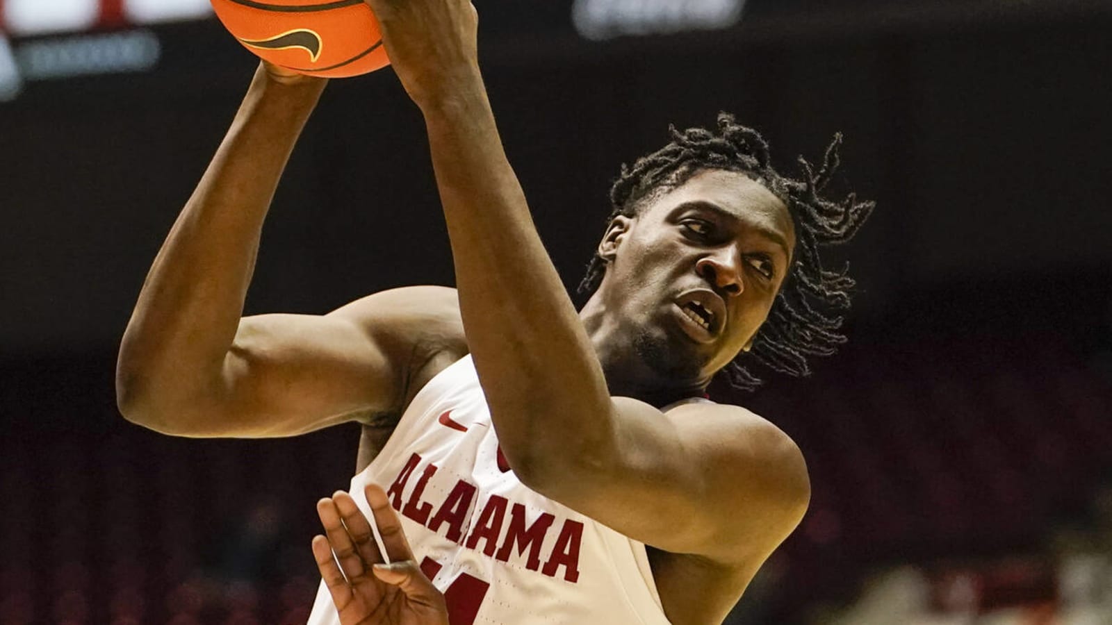 Alabama center Charles Bediako elects to remain in NBA Draft