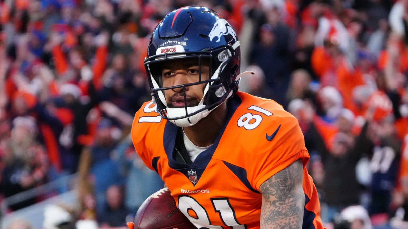 Broncos WR Tim Patrick carted off field