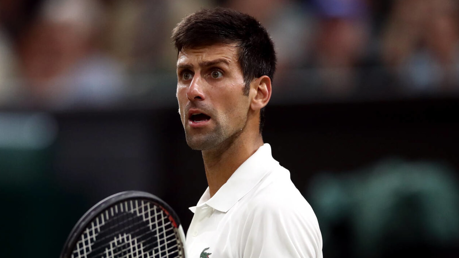 Novak Djokovic reacts after losing No. 1 ranking