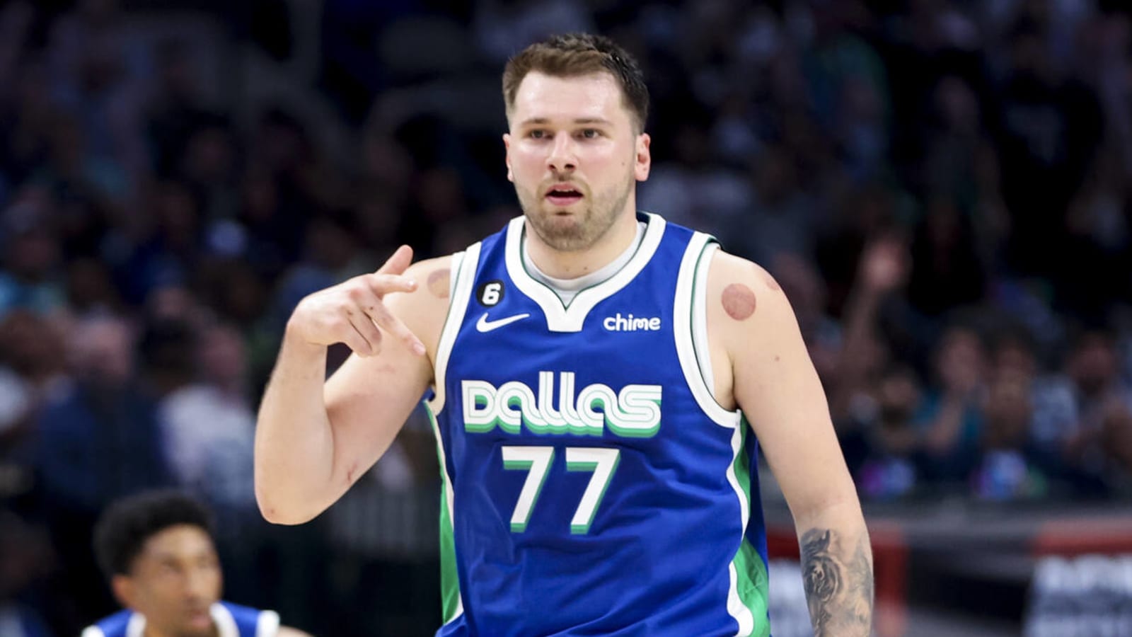 Watch: Luka Doncic threads the needle