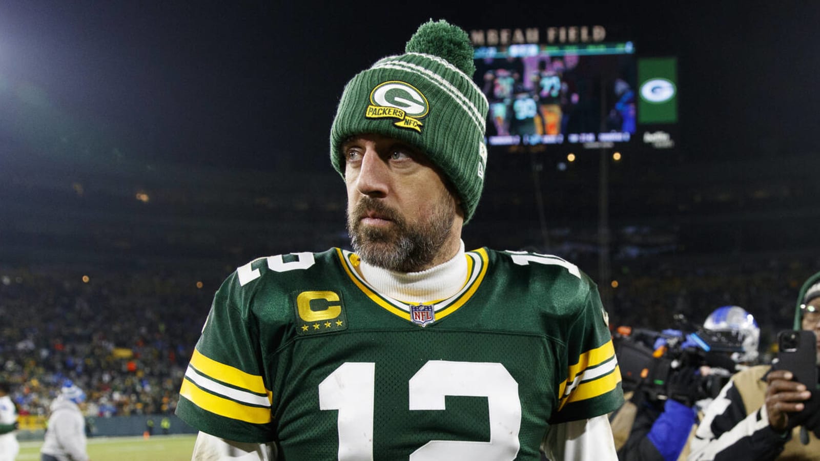 Aaron Rodgers says contract would need adjustment to return