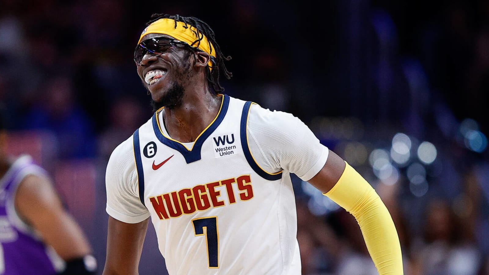 Defending champion Nuggets retain two key free-agent veterans